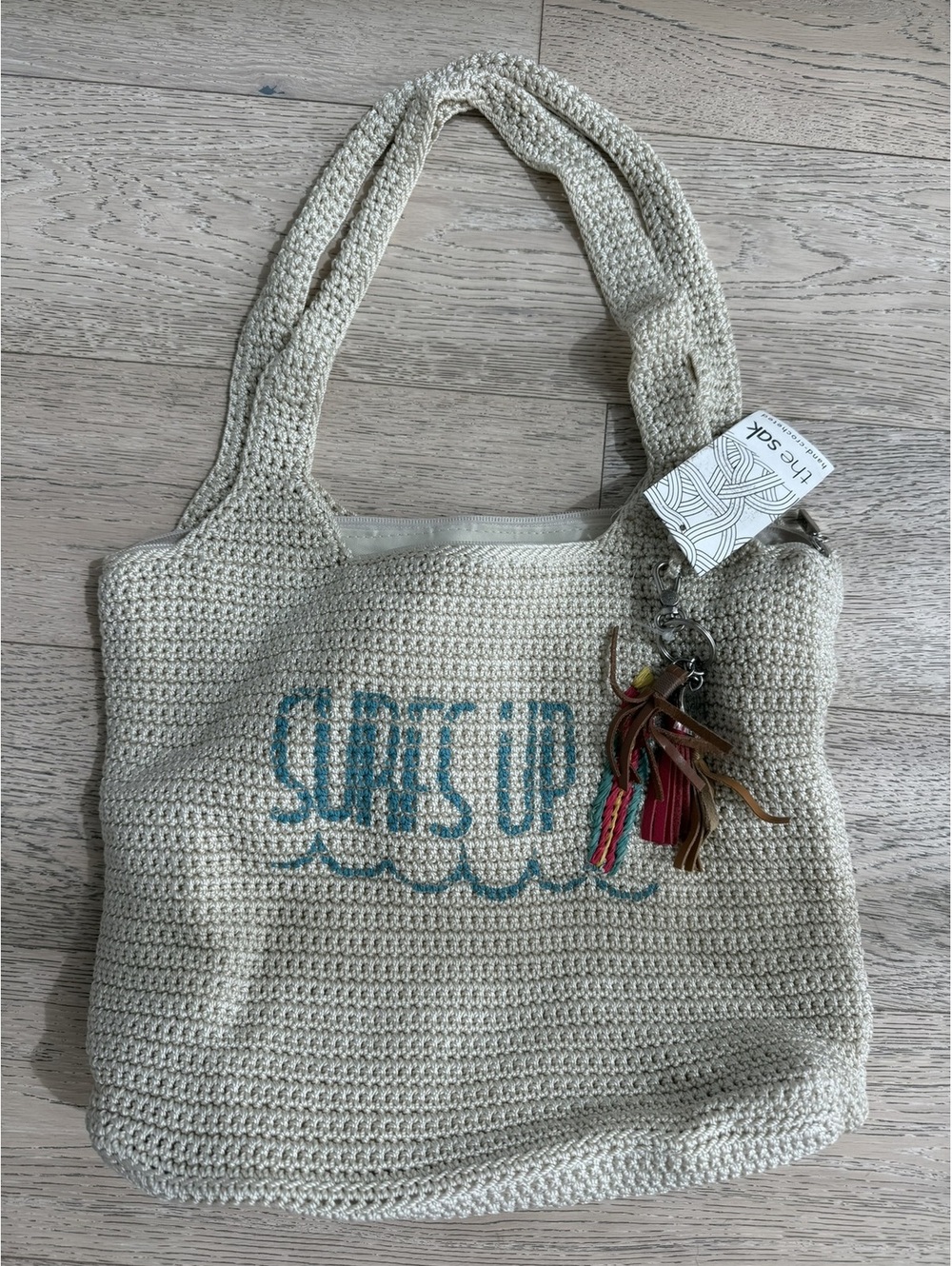 The Sak Hand-Crocheted 'Surf's Up' Tote Bag Beach Tassel Charm Travel Tote NWT